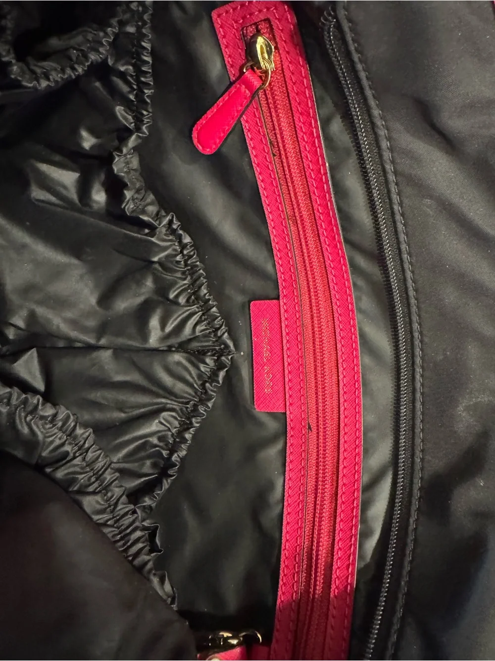 Michael Kors Black diaper bag  with Hot Pink Trim and Gold Accents